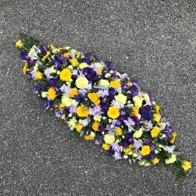 Yellow, purple, mauve, blue, coffin, casket, spray, funeral, tribute, wreath, flowers, Biggin Hill, Westerham, Orpington, Bromley, Sevenoaks, Florist 