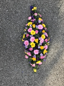 Bright, pink, yellow, purple, blue, coffin, casket, spray, Funeral, tribute, wreath, flowers, Biggin Hill, Westerham, Orpington, Bromley, Sevenoaks, Florist 