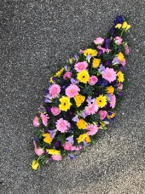 Bright, pink, yellow, purple, blue, coffin, casket, spray, Funeral, tribute, wreath, flowers, Biggin Hill, Westerham, Orpington, Bromley, Sevenoaks, Florist 